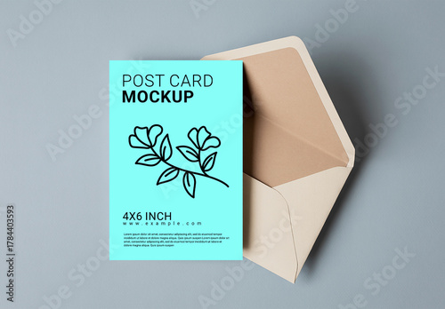 Postcard Mockup on Soft Blue Desk with Open Kraft Envelope