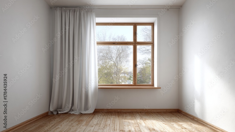 Fototapeta premium Empty room with a large window and white curtains floods with light.