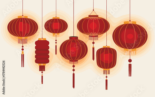 Red Chinese lanterns hanging with tassels and warm glow