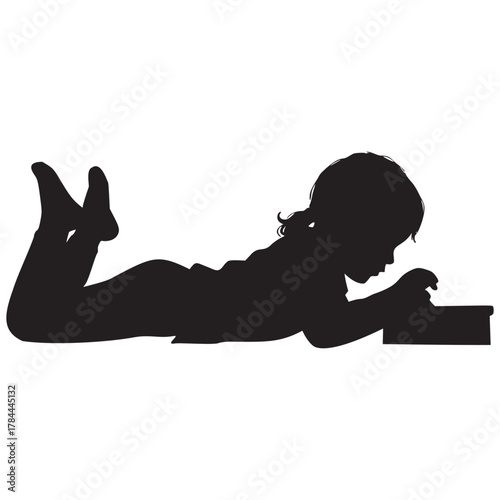 Captivating silhouette of a child immersed in reading, igniting imagination and learning, ideal for educational resources and promoting early literacy programs
