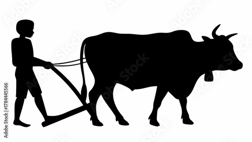 Silhouette of a man plowing a field with an ox, depicting traditional farming practices and rural life