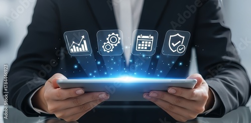 Professional uses modern tablet for business strategy, insights, scheduling, security