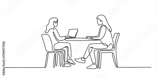 One continuous line drawing of two women sitting at a desk, one operating a laptop, symbolizing collaboration, business meeting, and teamwork.