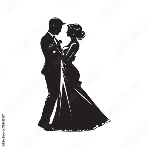 Romantic silhouette of a bride and groom embracing tenderly on their wedding day in a classic elegant pose silhouette