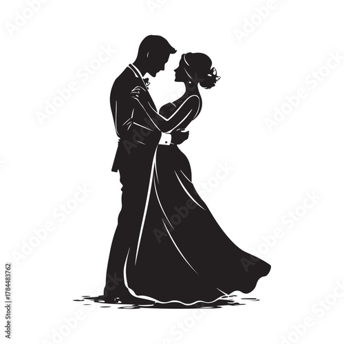 Romantic silhouette of a bride and groom embracing tenderly on their wedding day in a classic elegant pose silhouette