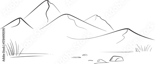 Mountain peaks and grassy terrain mountains rocks