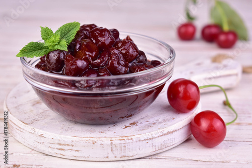 Cherry jam in a glass bowl. Close-up. Homemade cherry jam.
