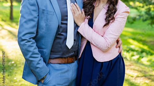 Young couple standing outdoor next to each other
