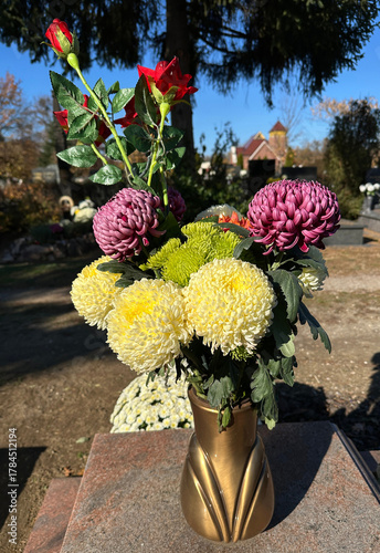 Flowers in a vase in the public cemtery