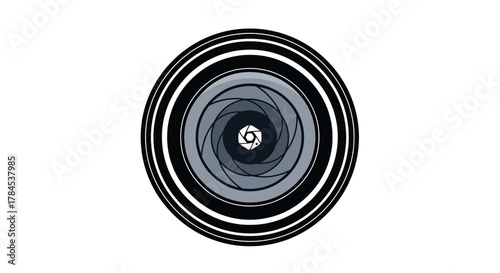 A central camera aperture design with spiral detail inside, encircled by rings