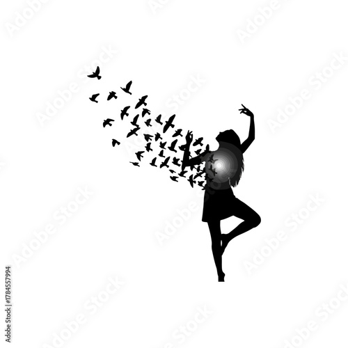 Black silhouette of a woman releasing a flock of flying birds from her chest, concept of freedom