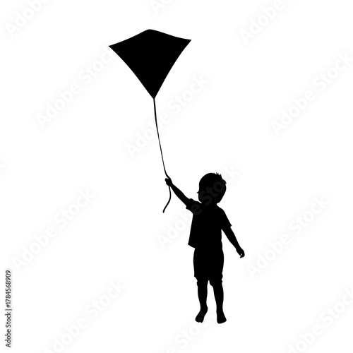 silhouette of a child holding a single balloon