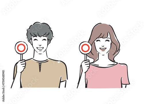 正解の札を持つ爽やかな30代男女