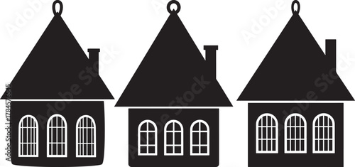 Three identical charming houses with pointed roofs and arched windows silhouette