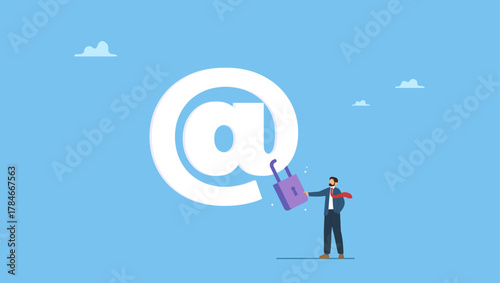 Confidence businessman standing with strong padlock security on email symbol. Email security protection, safety system to defend cyber attack, spam or data leak, data encryption technology.
