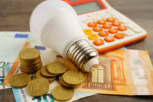 Cost of electric utilities with light bulb for payment.