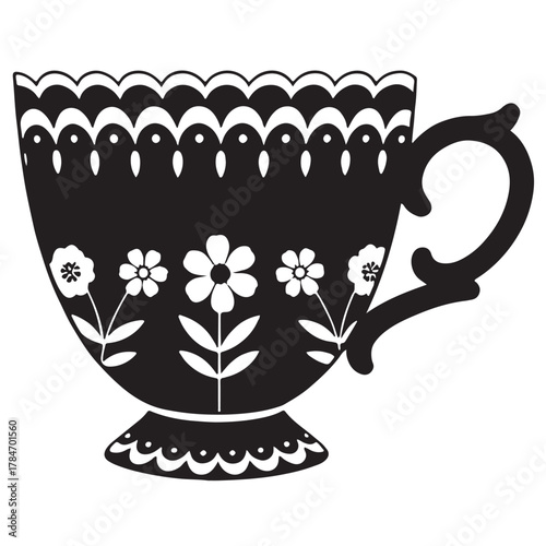 Black silhouette of a teacup with folk art flower decorations.