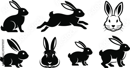 Collection of black rabbit and bunny silhouettes in various poses. Set of vector graphic icons and logo design elements isolated on white