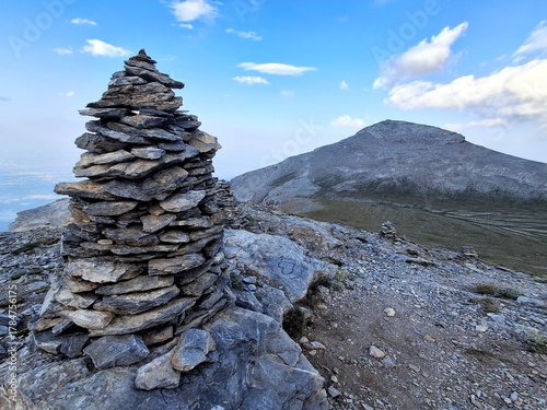 Stone cairn on mountain trail, Mount Olympus, Greece