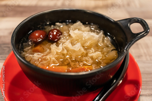 Traditional Chinese sweet soup made with white fungus, red dates, papaya and goji berries.