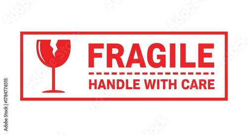 Close-up of a red fragile handle with care sticker on white background