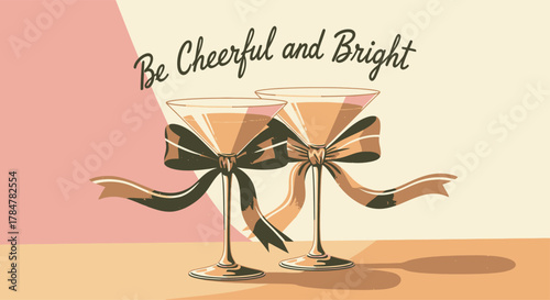 Two elegant martini glasses adorned with festive bows.