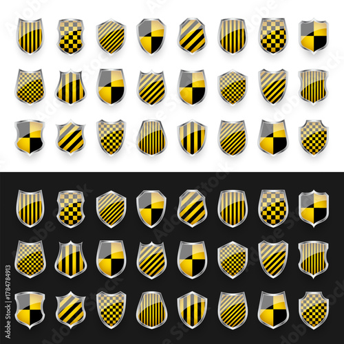 Glossy shields with yellow and black pattern. Security and protection concept. Cyber safety icons, internet privacy, web defense, digital data protection and antivirus themes. Vector illustration.
