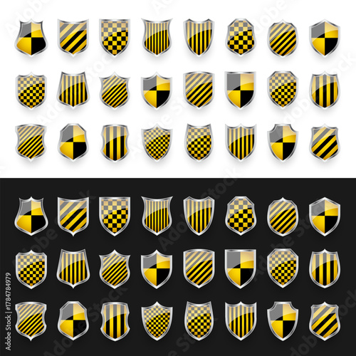 Glossy shields with yellow and black pattern. Security and protection concept. Cyber safety icons, internet privacy, web defense, digital data protection and antivirus themes. Vector illustration.