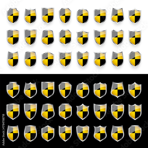 Glossy shields with yellow and black pattern. Security and protection concept. Cyber safety icons, internet privacy, web defense, digital data protection and antivirus themes. Vector illustration.