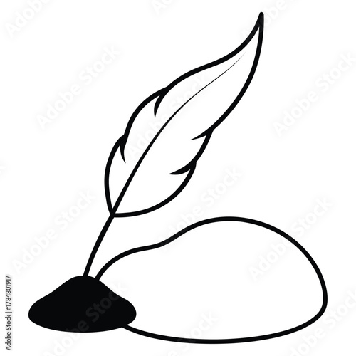 Quill pen resting on a dark mound