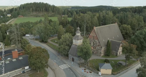 Aerial view of Lammi church, is a medieval stone church located in Lammi, in summer, Hämeenlinna, Finland.