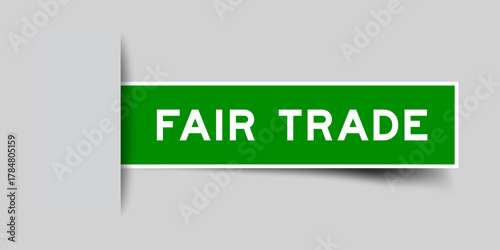 Green color square shape sticker label with word fair trade inserted in gray background