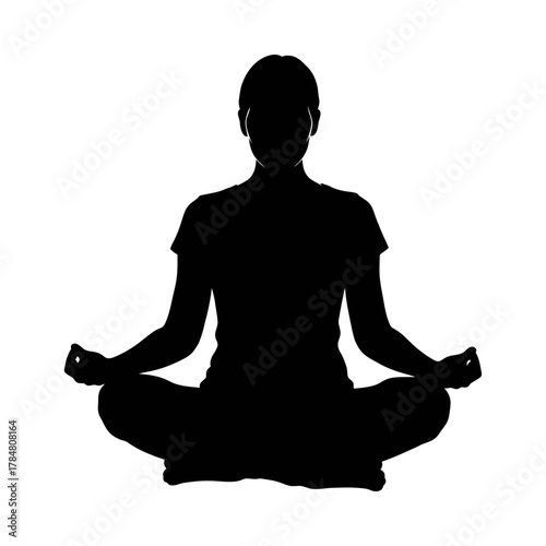 Silhouette of a person meditating in lotus position