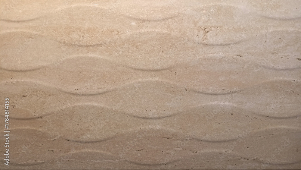 Fototapeta premium Texture of a cream tile or wall with a repeating diamond pattern.