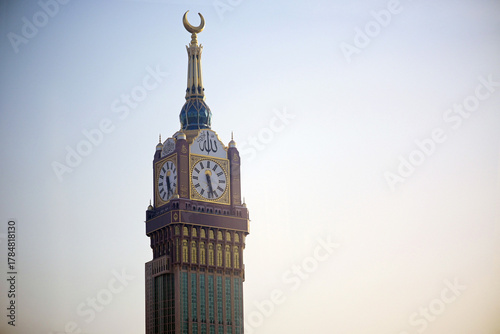 Dramatic view of the Abraj Al-Bait Clock Tower in Mecca against a clear sky