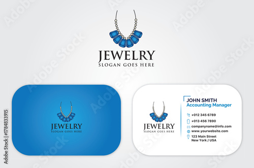 Vibrant blue gemstone necklace logo adorns a clean white business card and a coordinating solid blue background.