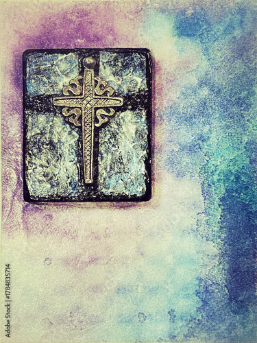 mixed media design of metal cross on painted surface with grunge effect paint