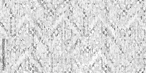 Abstract black and white textured background with vertical streaks and irregular patterns