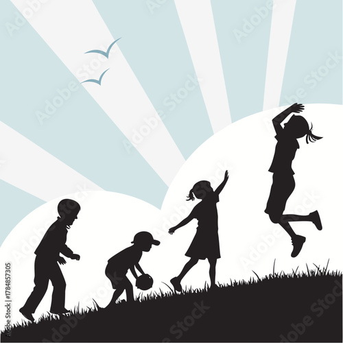 Silhouettes of children playing and jumping on a grassy hill under a bright sky