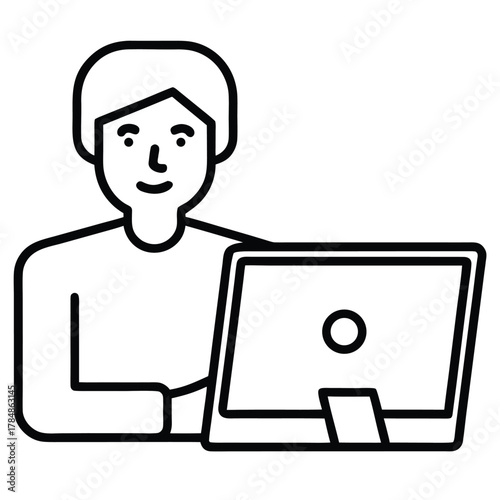 Person smiling while working at a computer