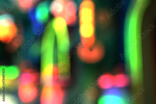 A close-up detail of blurred neon lights or bright reflections, showcasing strong neon lines and colors.