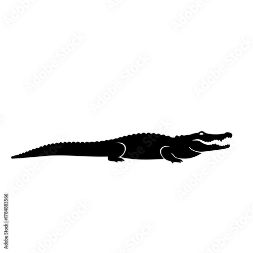 A simple black silhouette of a crocodile or alligator shown in profile view against a white background.