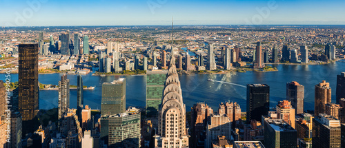 Fototapeta Naklejka Na Ścianę i Meble -  Aerial panoramic view of Midtown Manhattan skyscrapers and East River with Queens and Long Island City. New York City Skyline, USA