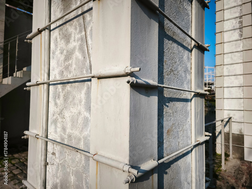 The columns were strengthened to protect the building from seismic movements, and the building was protected.