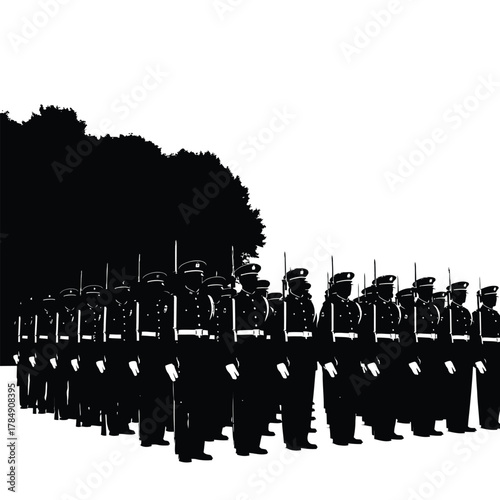 Silhouetted trees and fence reflected in water under a bright sky