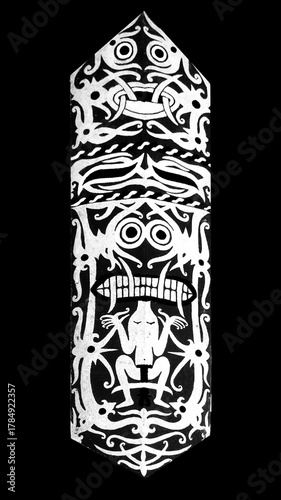 Black and white shield carving from the Dayak Taman tribe in West Kalimantan, Indonesia