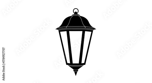 a classic lantern silhouette hanging from chain with intricate design