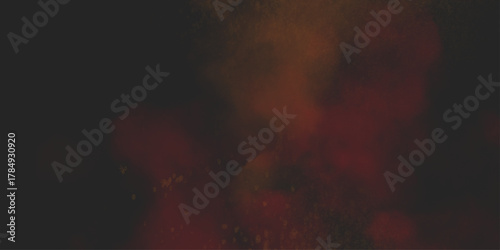 Brown texture. Orange powder explosion on black background. grunge and grainy abstract Flying through stormy brown clouds .