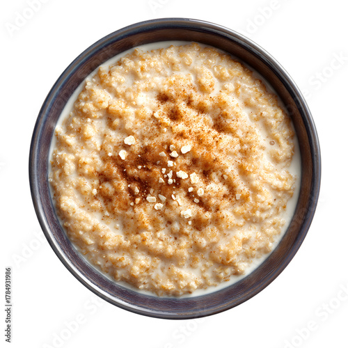 Delicious bowl of oatmeal with milk and cinnamon closeup on transparent background