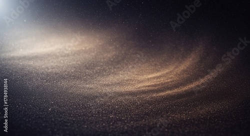 A dust cloud against a dark background.